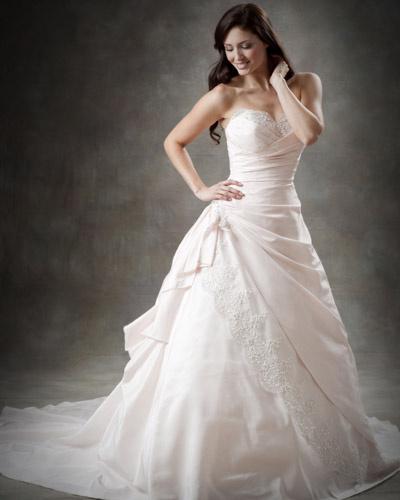 Stunning gowns from Romance by Carl M