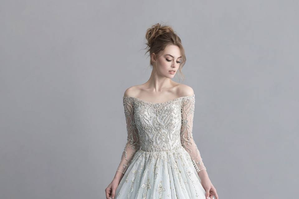 Cinderella dress with stunning beadwork and hints of blue throughout the skirt