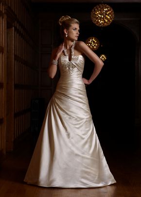 An image of a bride in a Natalie M Vail wedding dress