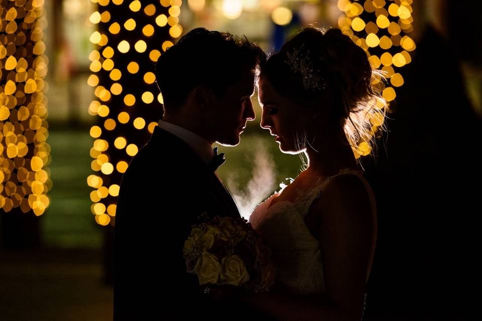 Bride and Groom with twinkling fairy lights