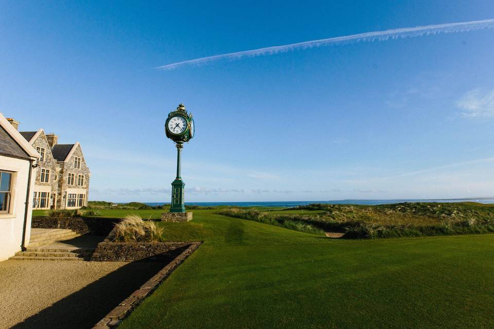 Blue skies and tall clock