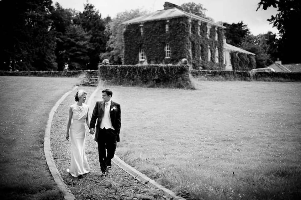 Newlyweds on the grounds of Tullylagan Country House Hotel