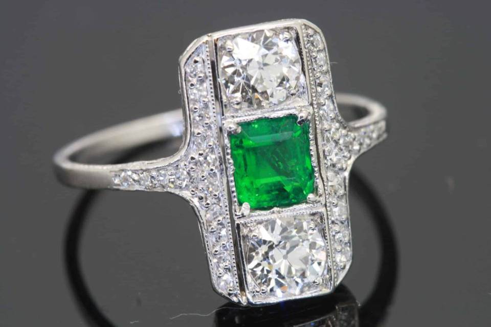 Emerald and diamond panel ring