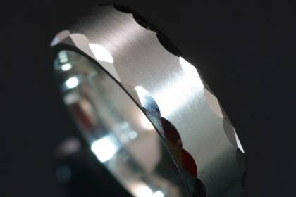 Custom-made zirconium wedding ring