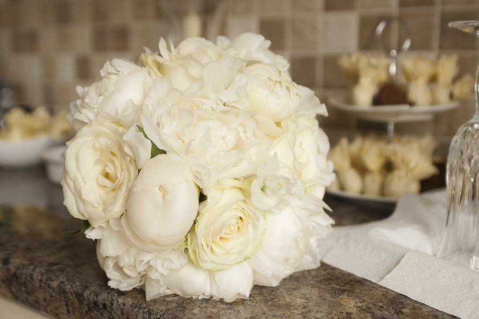 Tied bouquet of white Rose and Peony Rose